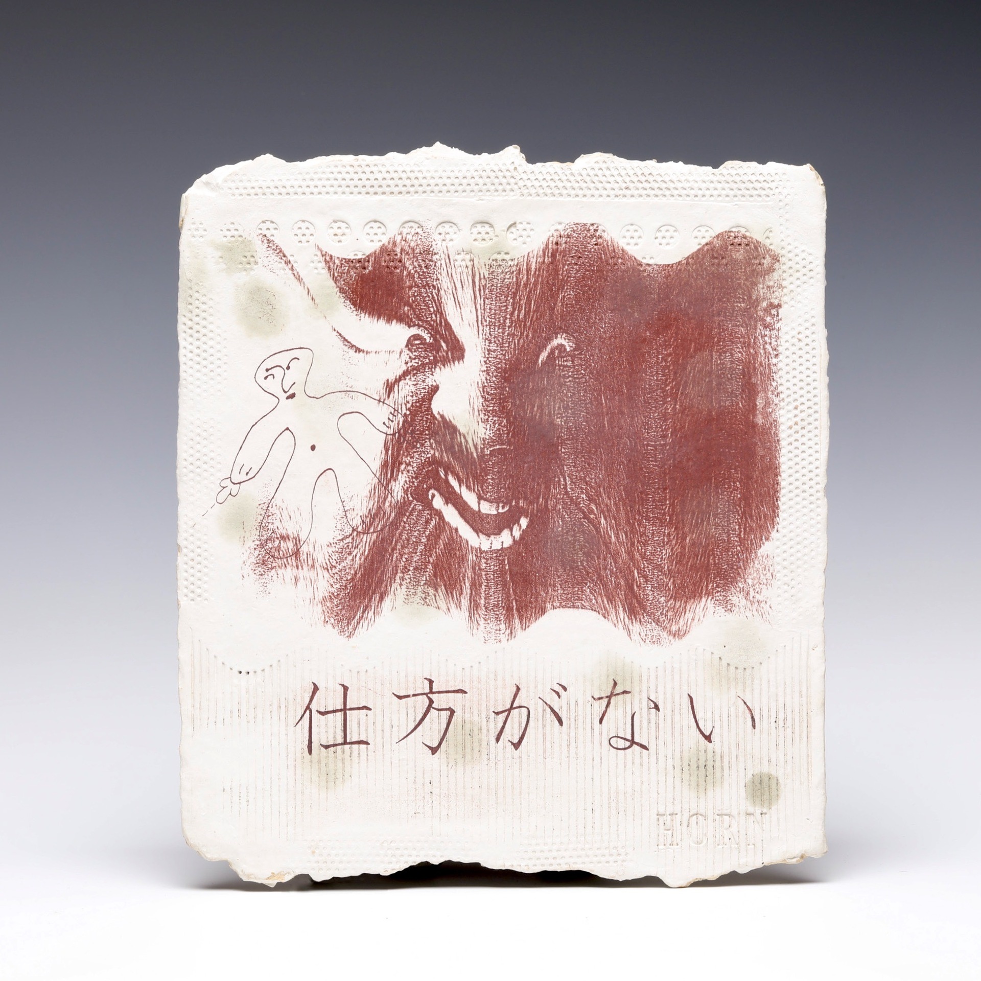 Stephen Horn ceramic, paper and clay sculpture with Japanese characters and a distorted face and figure
