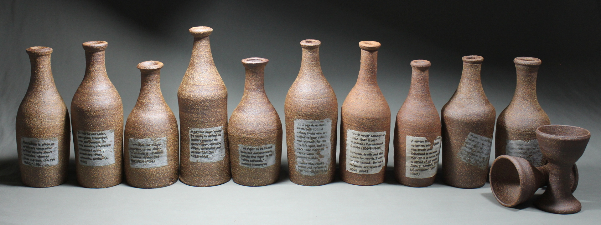 Marie Nagy created stoneware bottles with text lables for permanently preserving thoughts and ideas.