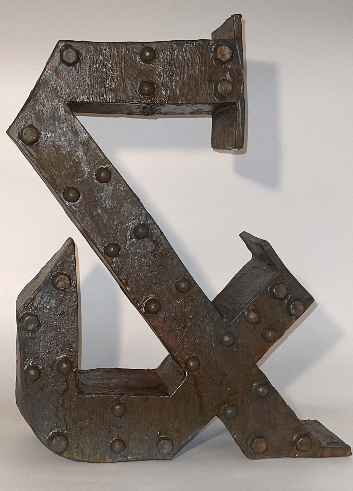 Cecilia Torres Ampersand 21 is a very angular version of that character fashioned in low fire paper clay, metal coating and patina.